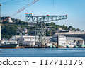 Port scene with giant cantilever crane 117713176