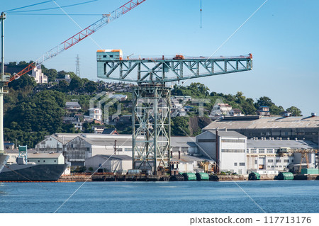 Port scene with giant cantilever crane 117713176