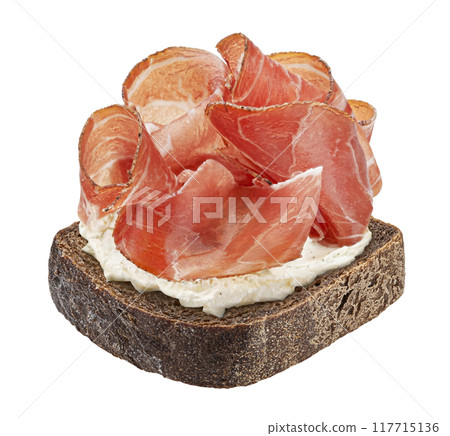 Italian prosciutto crudo sandwich, spanish jamon on rye bread slice isolated on white background 117715136