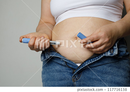 Woman injecting Semaglutide Ozempic injection control blood sugar levels Woman injecting Semaglutide Ozempic injection control blood sugar levels 117716138