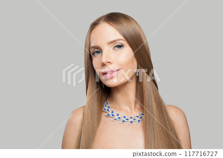 Posing brunette woman looking at cemera,  117716727