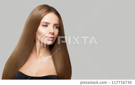 Brunette model. Woman with long brown hair, natural makeup and healthy clean skin 117716730