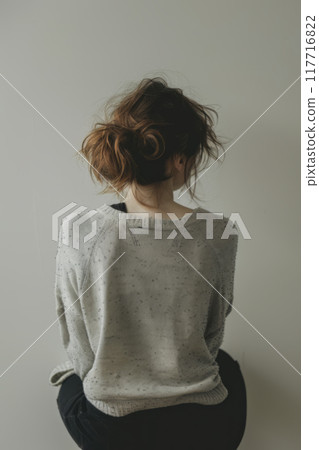 Young Woman Facing Away from Camera Young Woman Facing Away from Camera 117716822