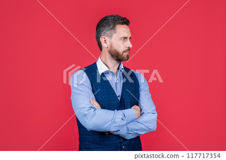 mature ambitious man businessman in businesslike suit has grizzled hair looking aside, confidence mature ambitious man businessman in businesslike suit has grizzled hair looking aside, confidence 117717354