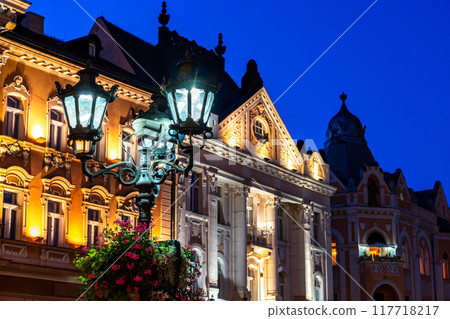 Vintage street iron lamp in the center of Novi sad in Serbia at night Vintage street iron lamp in the center of Novi sad in Serbia at night 117718217