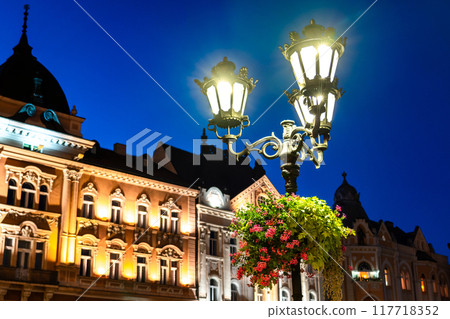Vintage street iron lamp in the center of Novi sad in Serbia at night Vintage street iron lamp in the center of Novi sad in Serbia at night 117718352