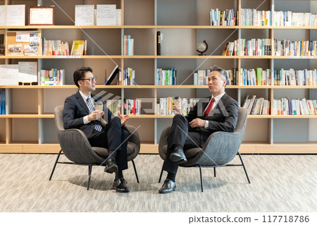 Businessman, conversation, relaxing Businessman, conversation, relaxing 117718786