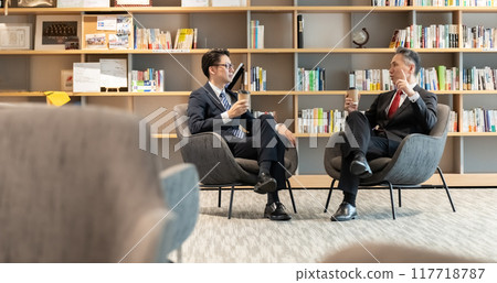 Businessman, conversation, relaxing Businessman, conversation, relaxing 117718787