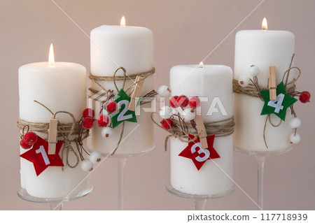 Traditional four advent weeks calendar before Christmas holidays. Candles and plastic free zero waste sustainable decoration. Copy space greeting card mock up template. Winter cozy 117718939
