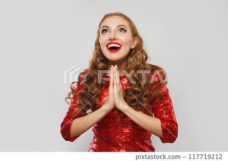 Lovely woman fashion model with bright make-up, shiny clear skin and long healthy curly hairstyle Lovely woman fashion model with bright make-up, shiny clear skin and long healthy curly hairstyle 117719212