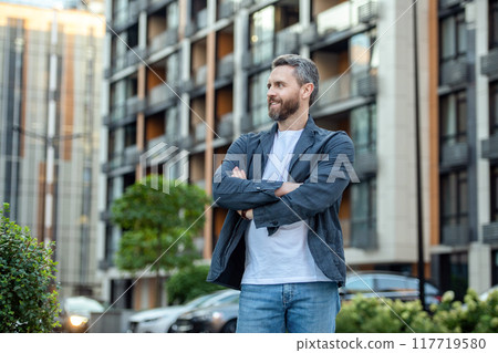 caucasian man in stylish clothes. stylish man outdoor. man wear stylish outfit. caucasian man in stylish clothes. stylish man outdoor. man wear stylish outfit. 117719580