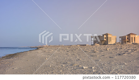 Abandoned beach resort construction site at sunset, Egypt. Abandoned beach resort construction site at sunset, Egypt. 117720380