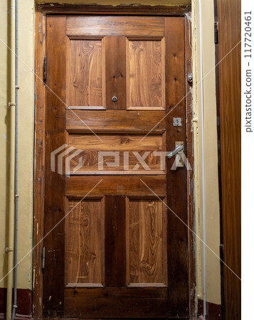 wooden door illuminated by electric light wooden door illuminated by electric light 117720461