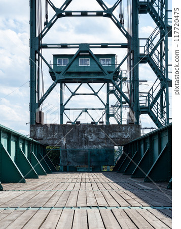 buildings of old railway bridge iin old harbor 117720475