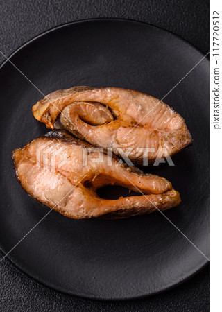 Delicious red salmon r trout fish grilled with spices and herbs Delicious red salmon r trout fish grilled with spices and herbs 117720512