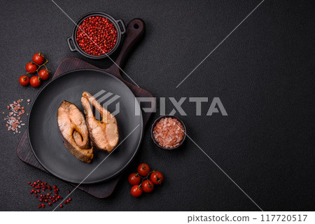 Delicious red salmon r trout fish grilled with spices and herbs Delicious red salmon r trout fish grilled with spices and herbs 117720517