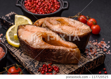 Delicious red salmon r trout fish grilled with spices and herbs Delicious red salmon r trout fish grilled with spices and herbs 117720525