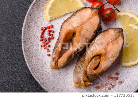Delicious red salmon r trout fish grilled with spices and herbs Delicious red salmon r trout fish grilled with spices and herbs 117720535