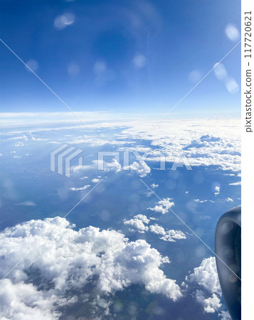 white clouds in blue sky over earth white clouds in blue sky over earth 117720621