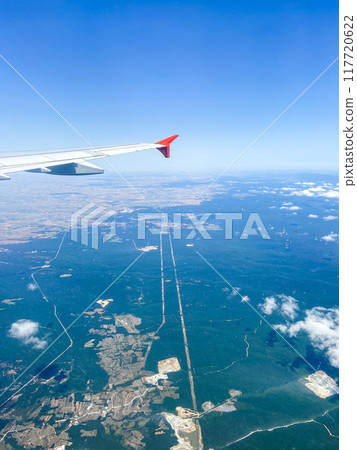 airplane wing and aerial view of seaside lands airplane wing and aerial view of seaside lands 117720622