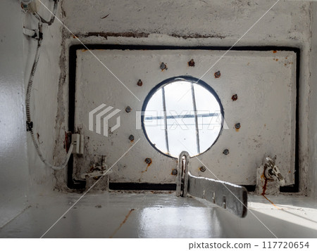 withe battened porthole in old ship withe battened porthole in old ship 117720654