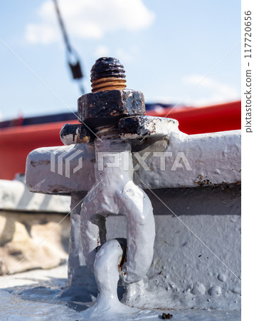 bolt of outer hatch on deck of ship close up bolt of outer hatch on deck of ship close up 117720656