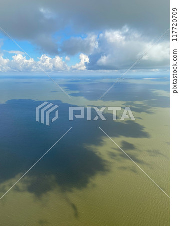 view of gray clouds and green water of Baltic Sea view of gray clouds and green water of Baltic Sea 117720709
