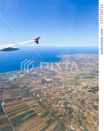 airplane wing and aerial view of fields in Turkey airplane wing and aerial view of fields in Turkey 117720714