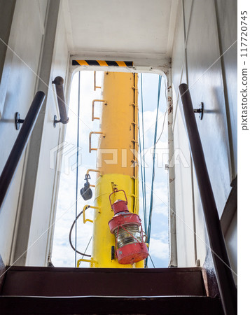 view from the hold to the yellow mast of the ship view from the hold to the yellow mast of the ship 117720745