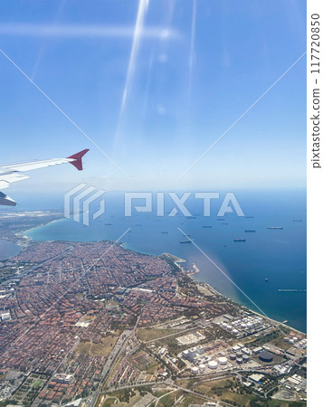 airplane wing and view of seaside city in Turkey airplane wing and view of seaside city in Turkey 117720850