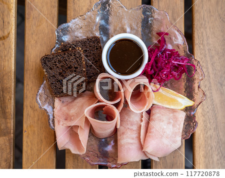stroganina frozen fish on plate on wooden table stroganina frozen fish on plate on wooden table 117720878