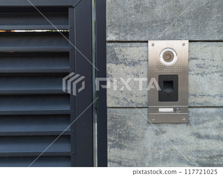 Stainless Steel Intercom on Concrete Wall Stainless Steel Intercom on Concrete Wall 117721025