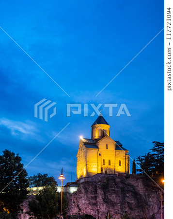 illuminated Metekhi church in Tbilisi in night 117721094