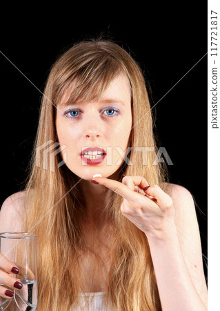 Taking a pill 117721817