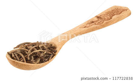 Dried Valerian root in wooden spoon isolated on white background. Valeriana officinalis with full depth of field. Dried Valerian root in wooden spoon isolated on white background. Valeriana officinalis with full depth of field. 117722838
