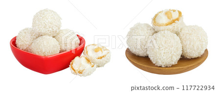 round candy raffaello with coconut flakes and nut in ceramic bowl isolated on white background round candy raffaello with coconut flakes and nut in ceramic bowl isolated on white background 117722934