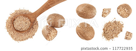 Whole and grated nutmeg in wooden spoon isolated on white background with full depth of field. Top view. Flat lay Whole and grated nutmeg in wooden spoon isolated on white background with full depth of field. Top view. Flat lay 117722935