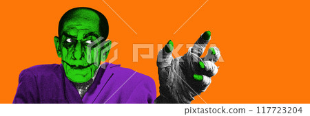 Green-skinned terrifying man in purple robe, with bandaged hand, glowing green nails reaching forward, against striking orange background. Contemporary art collage. Green-skinned terrifying man in purple robe, with bandaged hand, glowing green nails reaching forward, against striking orange background. Contemporary art collage. 117723204