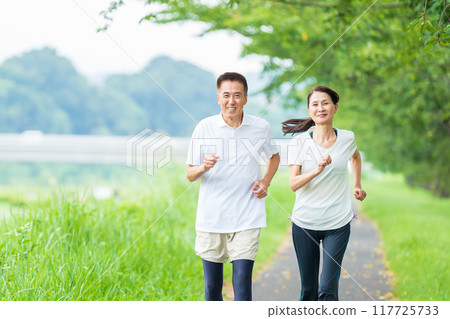 Senior couple doing jogging Senior couple doing jogging 117725733