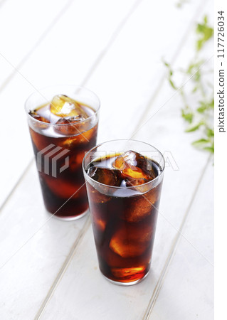 iced coffee poured into a glass 117726034