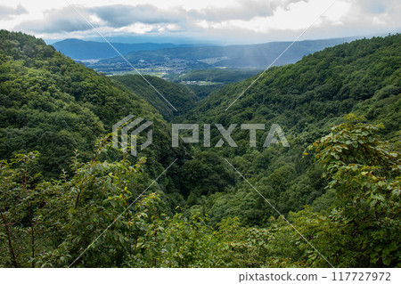 Yokoya Valley in summer, view from Yokoya Kannon Observatory, Chino City, Nagano Prefecture, Japan 117727972