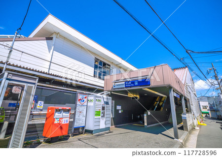 Yokohama cityscape, Japan, August. View of the south exit of SOTETSU Nishiya Station. There are parcel lockers next to the entrance. Yokohama cityscape, Japan, August. View of the south exit of SOTETSU Nishiya Station. There are parcel lockers next to the entrance. 117728596