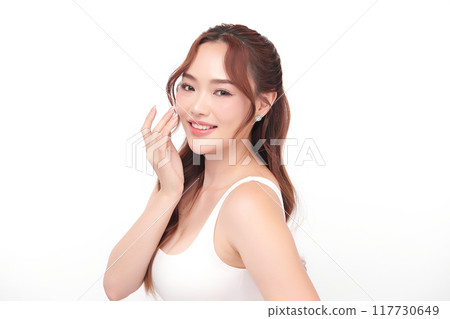 Beautiful young asian woman with clean fresh skin on white background, Face care, Facial treatment, Cosmetology, beauty and spa, Asian women portrait. Beautiful young asian woman with clean fresh skin on white background, Face care, Facial treatment, Cosmetology, beauty and spa, Asian women portrait. 117730649