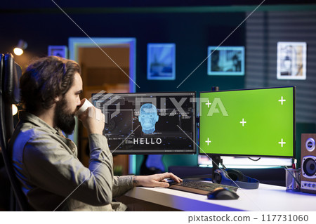 Software developer drinking coffee, watching AI on green screen PC gaining consciousness. Computer scientist consuming hot beverage, seeing artificial intelligence talking on mockup monitor Software developer drinking coffee, watching AI on green screen PC gaining consciousness. Computer scientist consuming hot beverage, seeing artificial intelligence talking on mockup monitor 117731060