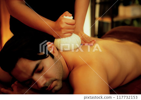 Hot herbal ball spa massage body treatment. Quiescent Hot herbal ball spa massage body treatment. Quiescent 117732153