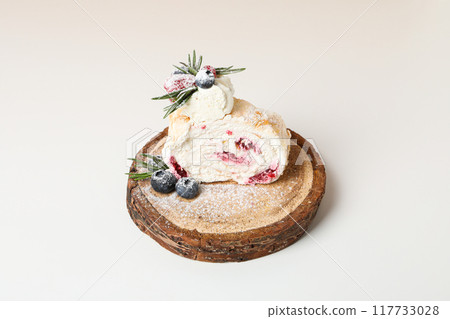 Meringue roll, concept of tasty and delicious food 117733028