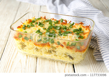 Concept of tasty and delicious homemade food - potato casserole Concept of tasty and delicious homemade food - potato casserole 117733096