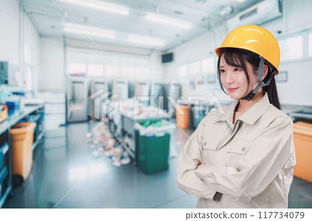 A young woman working in garbage collection 117734079