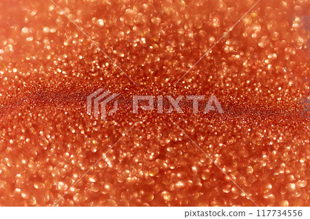 Sparkling orange glitter abstract background 117734556