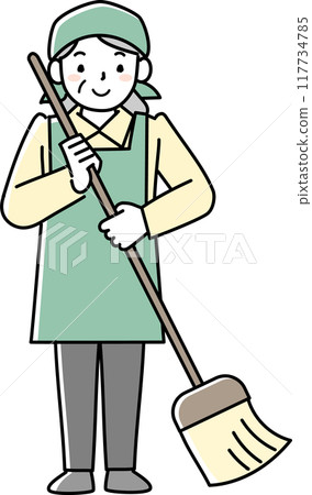 Senior woman wearing an apron holding cleaning tools Senior woman wearing an apron holding cleaning tools 117734785